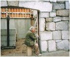 Travaux sur mur en pierre